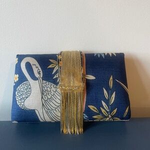 NWT Exotic blue clutch with metallic fringe
